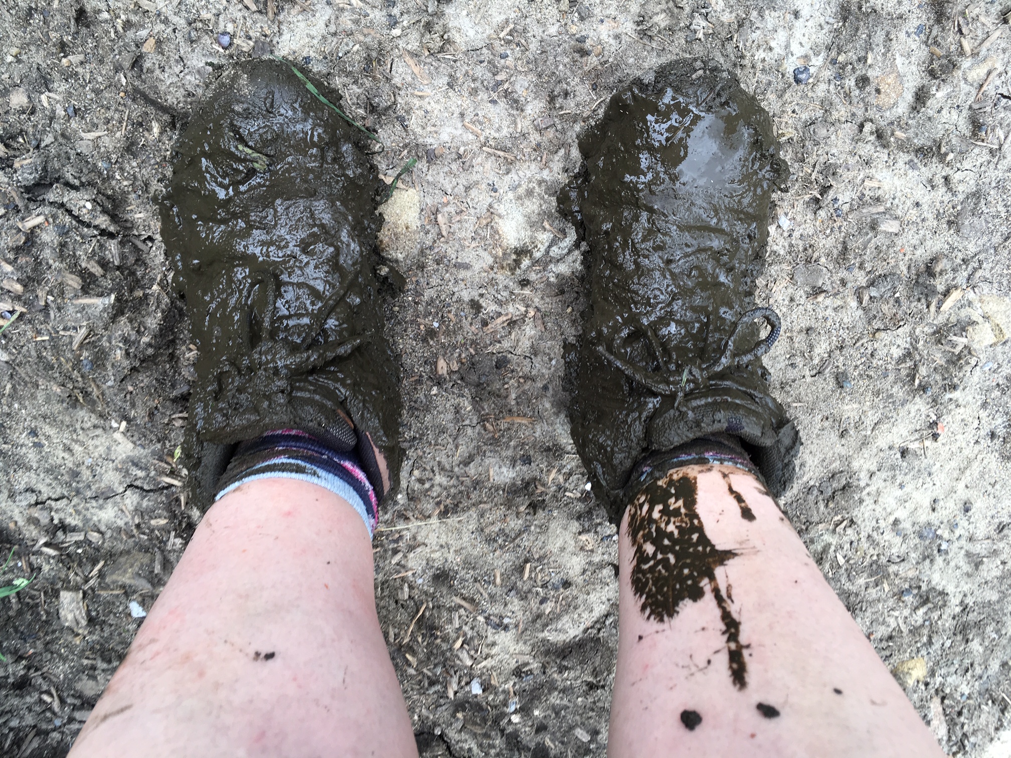 A pair of muddy walking boots