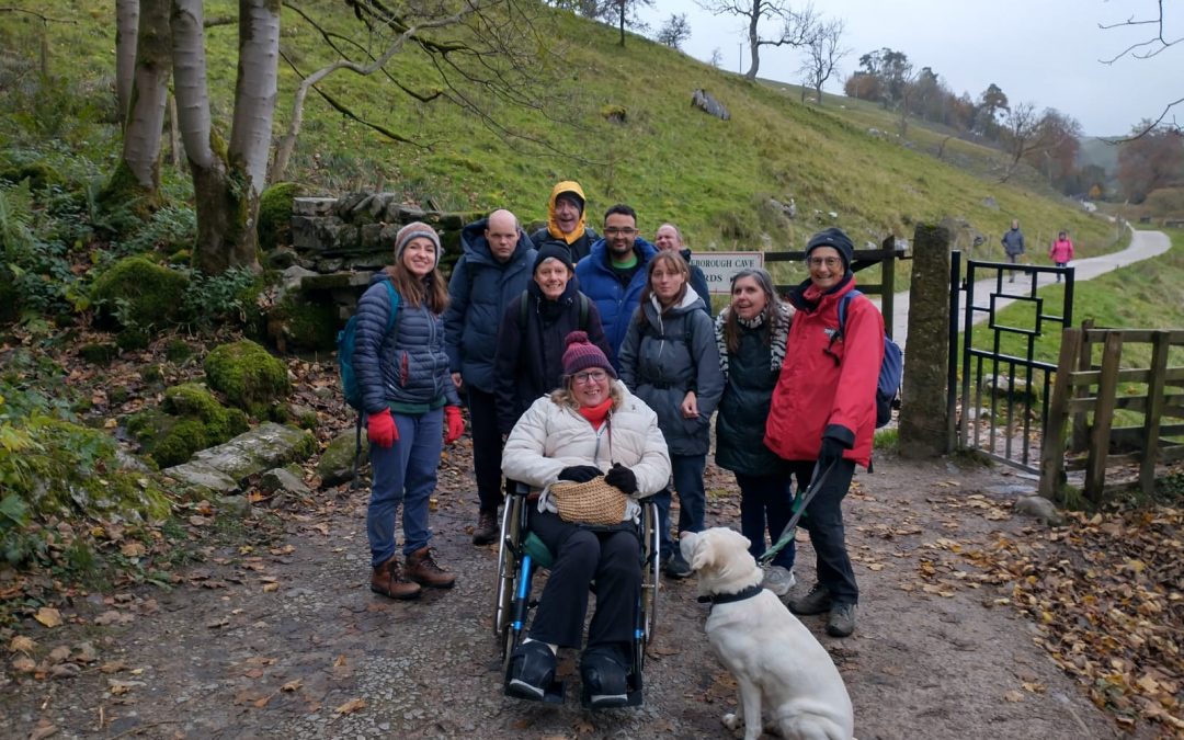 A group of Open Country members on a woodland path