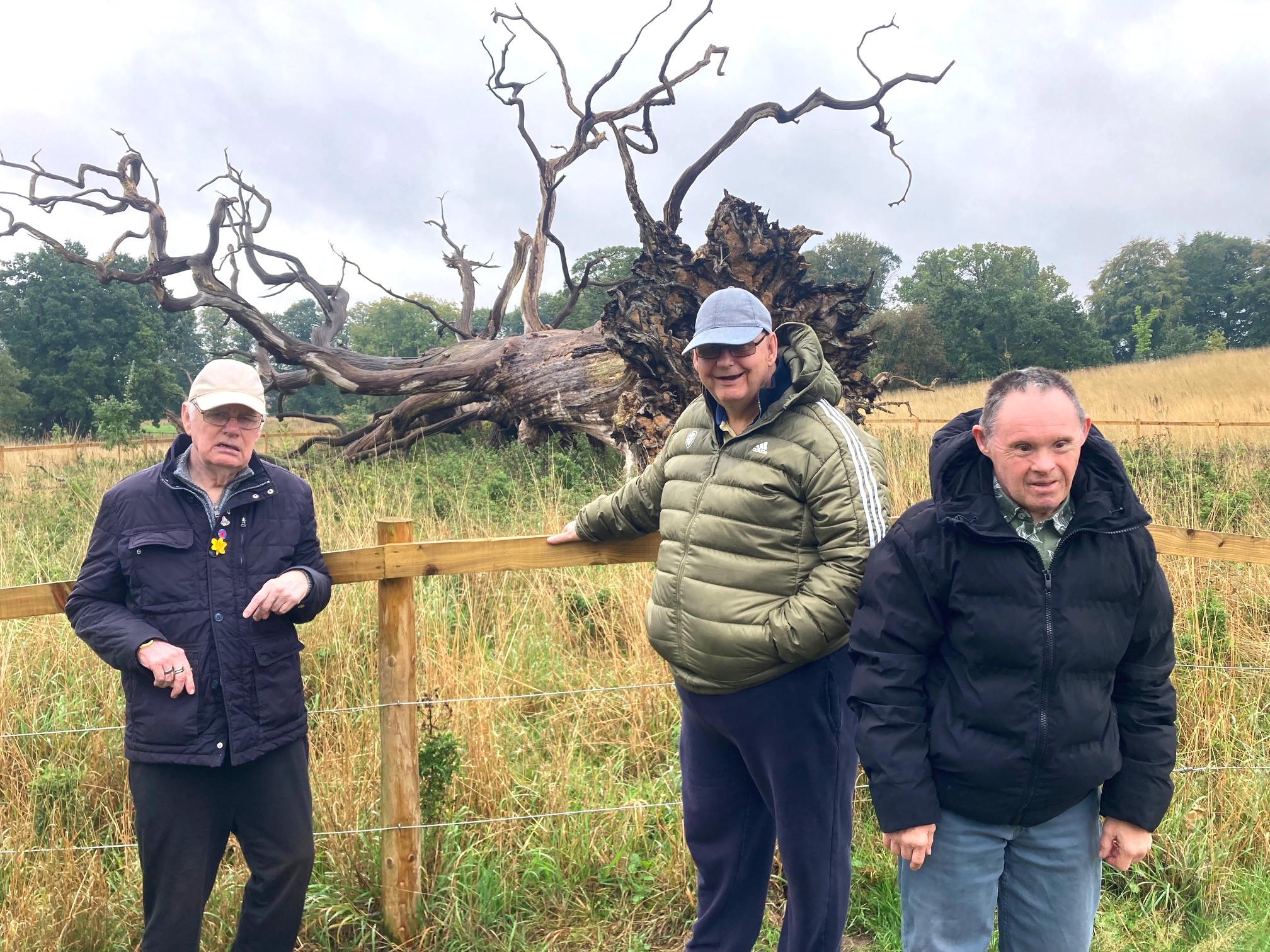 Jacob Smith Park Three people standing in front of an old tree